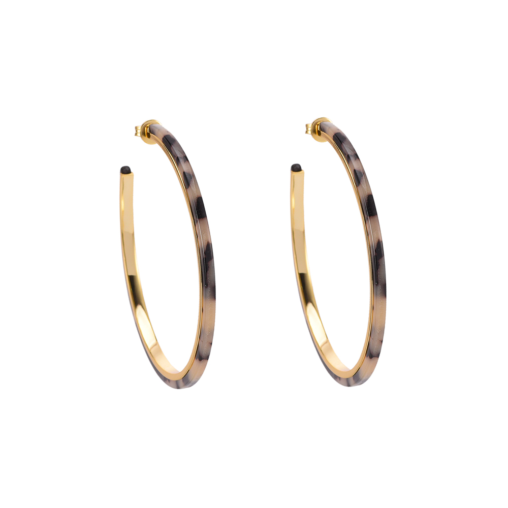 Boucles d'oreilles créoles modèle moyen en argent doré et résine noire et blanche 3