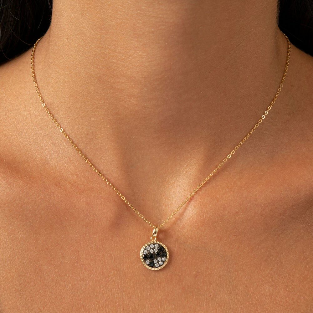 Golden necklace with white and black zirconia 4